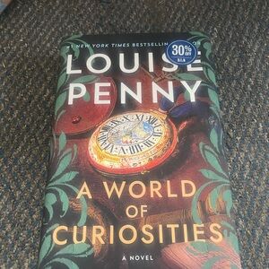 A World of Curiosities - New York Times Bestselling Hardcover Novel